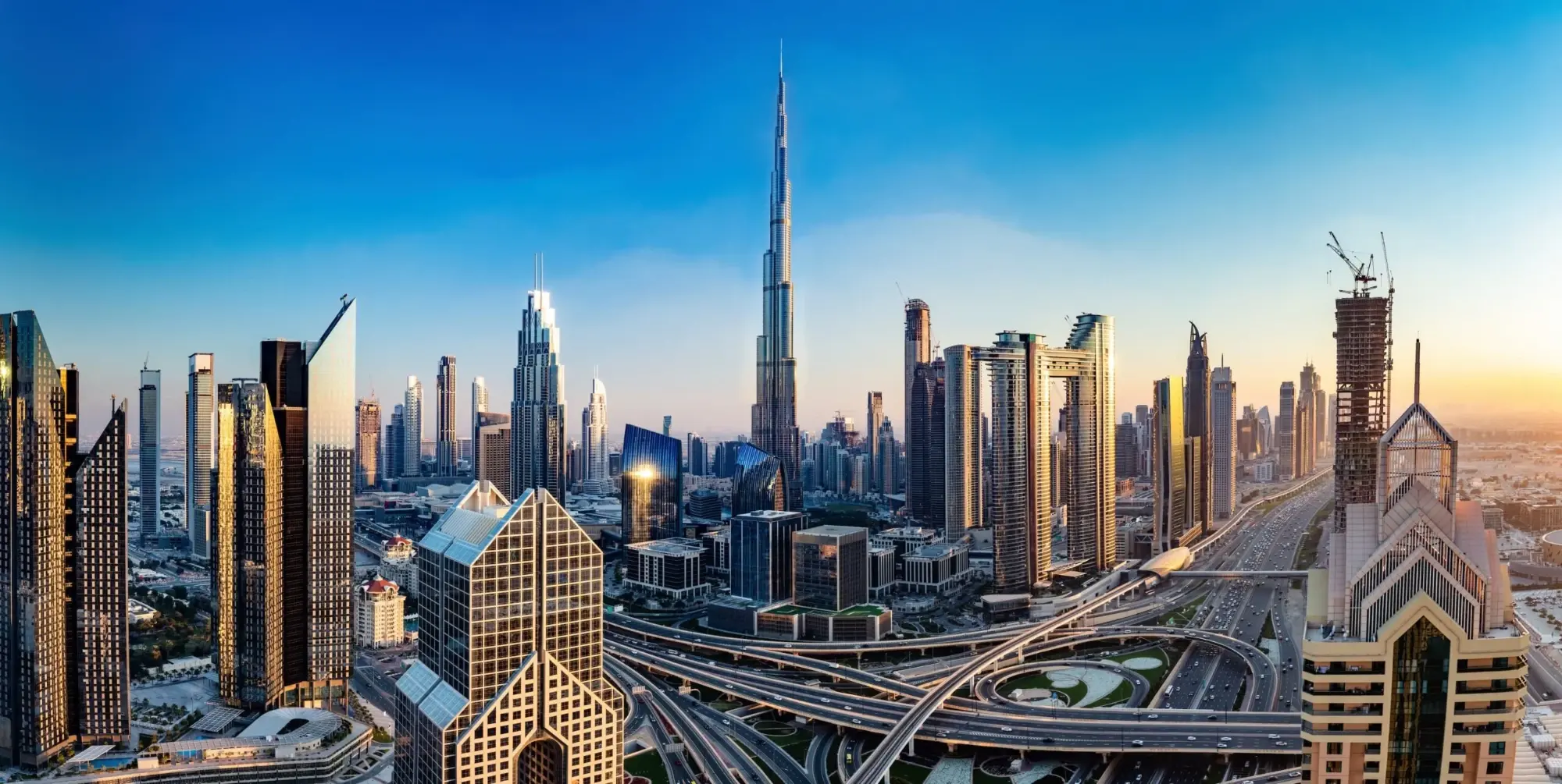 Downtown Dubai with Burj Khalifa above the road interchange